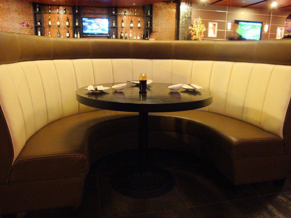 Booth seating and tables at Cidco Family Restaurant